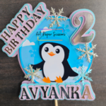 Personalized penguin birthday cake topper with custom name, age and snowflake winter theme