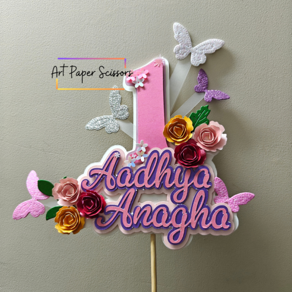Personalized first birthday cake topper with custom name, pink number one, paper flowers and butterflies
